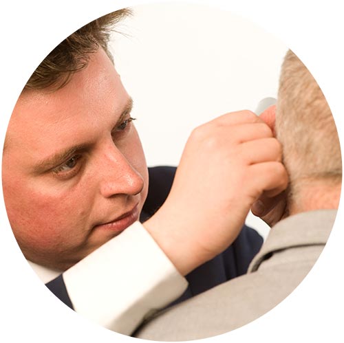 Mark Williams - audiologiest at the tinnitus clinic conducting inspection of ear